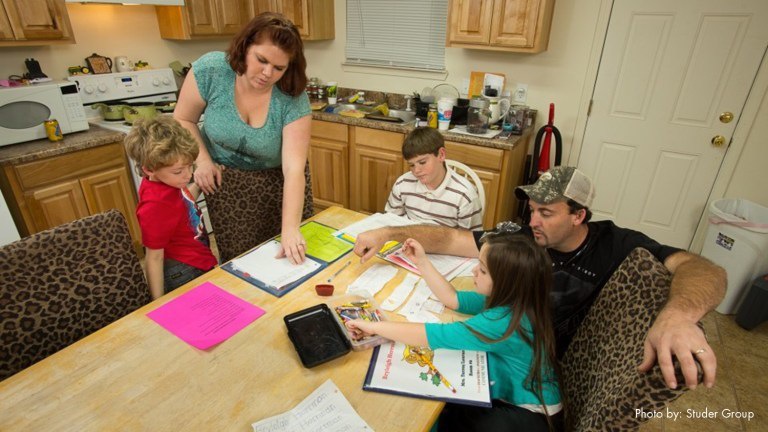 The Herrman family gets ready for dinner while doing homework at their home in Milton, Fl., Thursday, January 16, 2015. From left, Waylon,7, Tiffanny, Hunter,8, Kevin and Bryleigh,4,. (Michael Spooneybarger/ Pensacola Today)